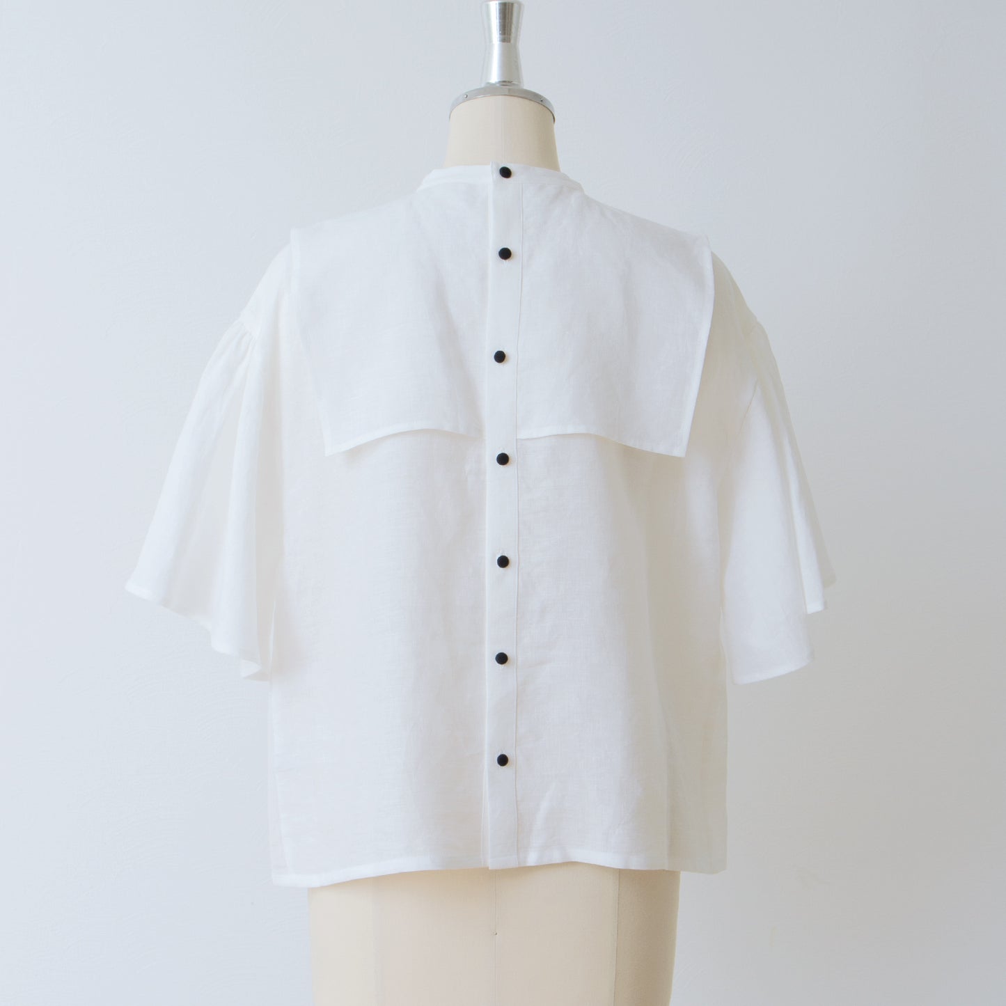 Yoke layer flare half sleeve linen blouse/off white